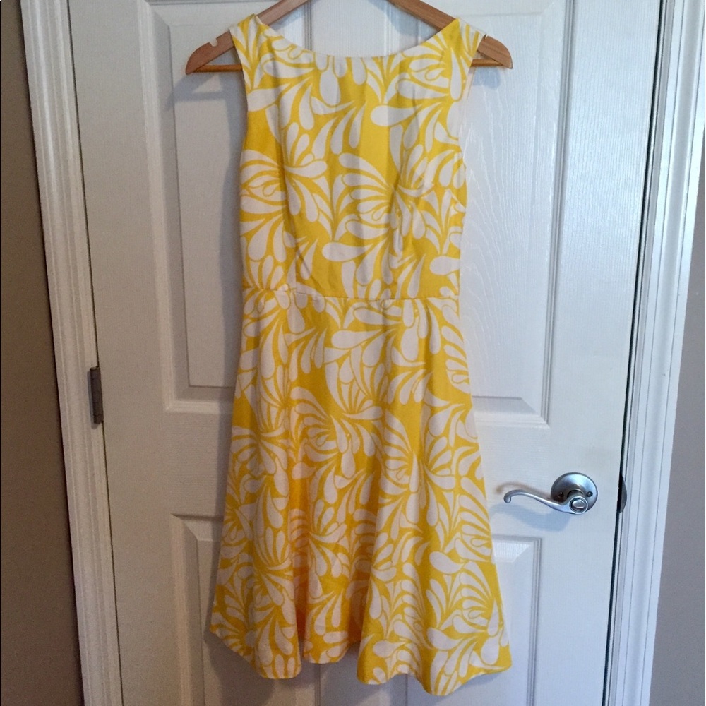 Yellow and white dress.
